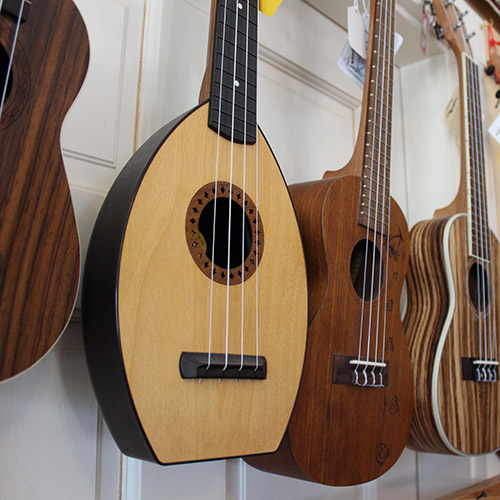 ukes hanging on the wall