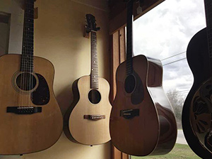 guitars hanging in by the window